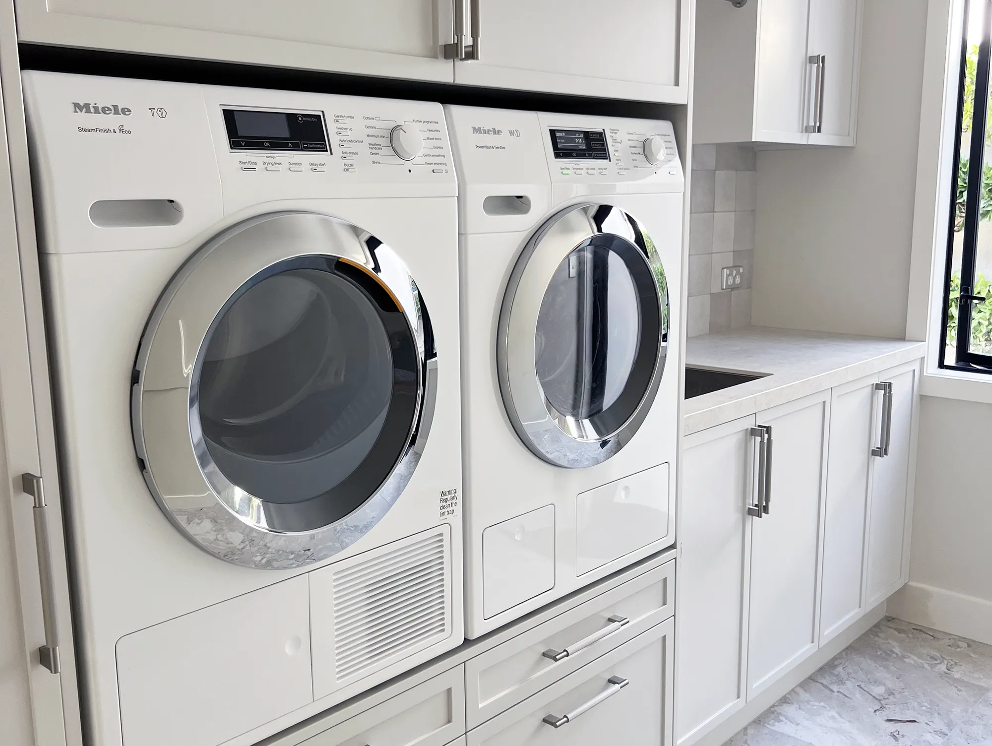 Practical and beautiful laundry by award winning designer Kira Gray